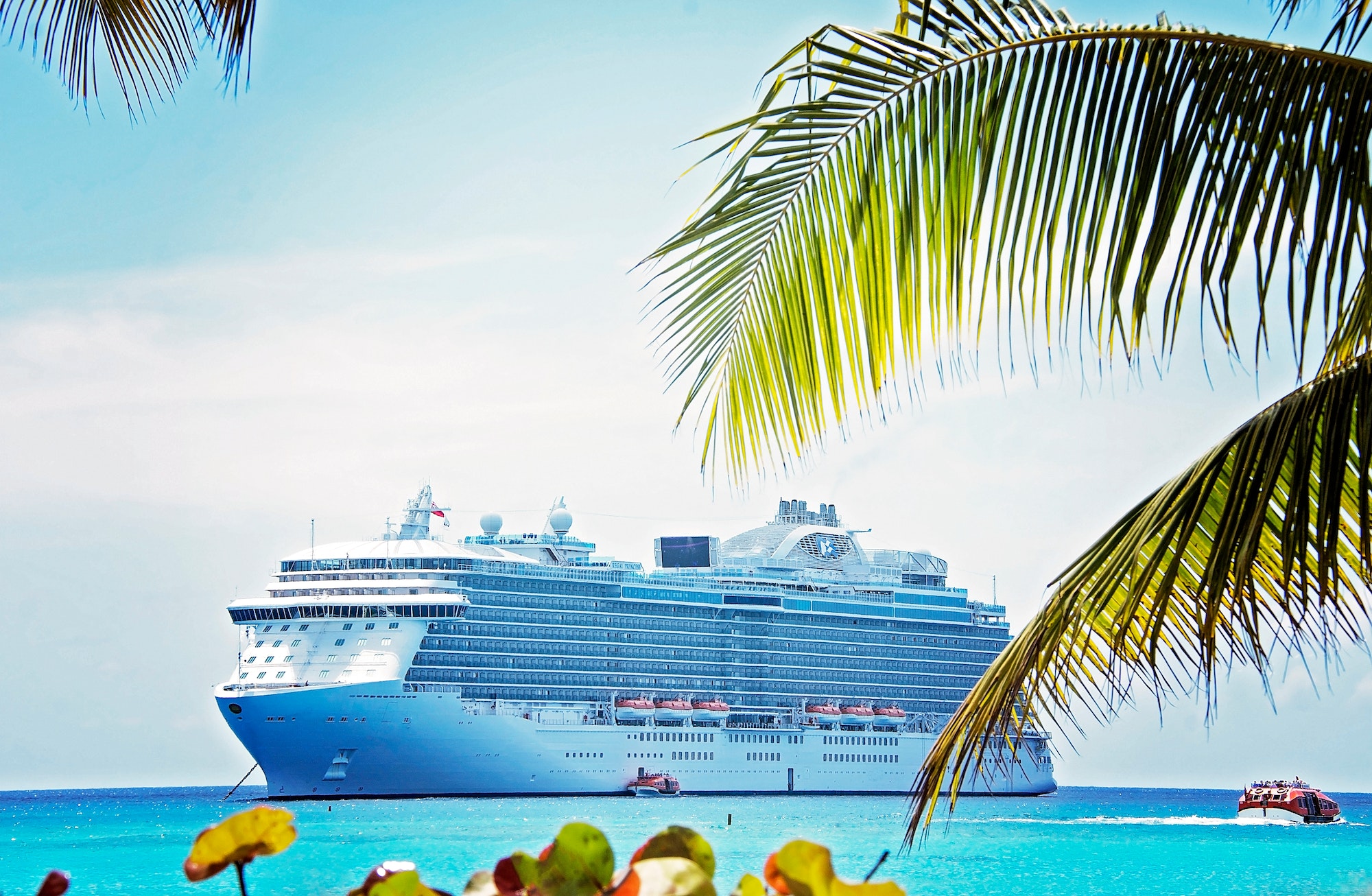 Massive cruise liner ship, anchored in the Bahamas for a day of beach and water excursions.